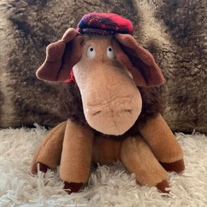 VINTAGE CAROUSEL BRAND MOOSE STUFFED ANIMAL IN A PLAID HUNTING HAT.
